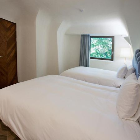 Ecoland Hotel Jeju Esterno foto